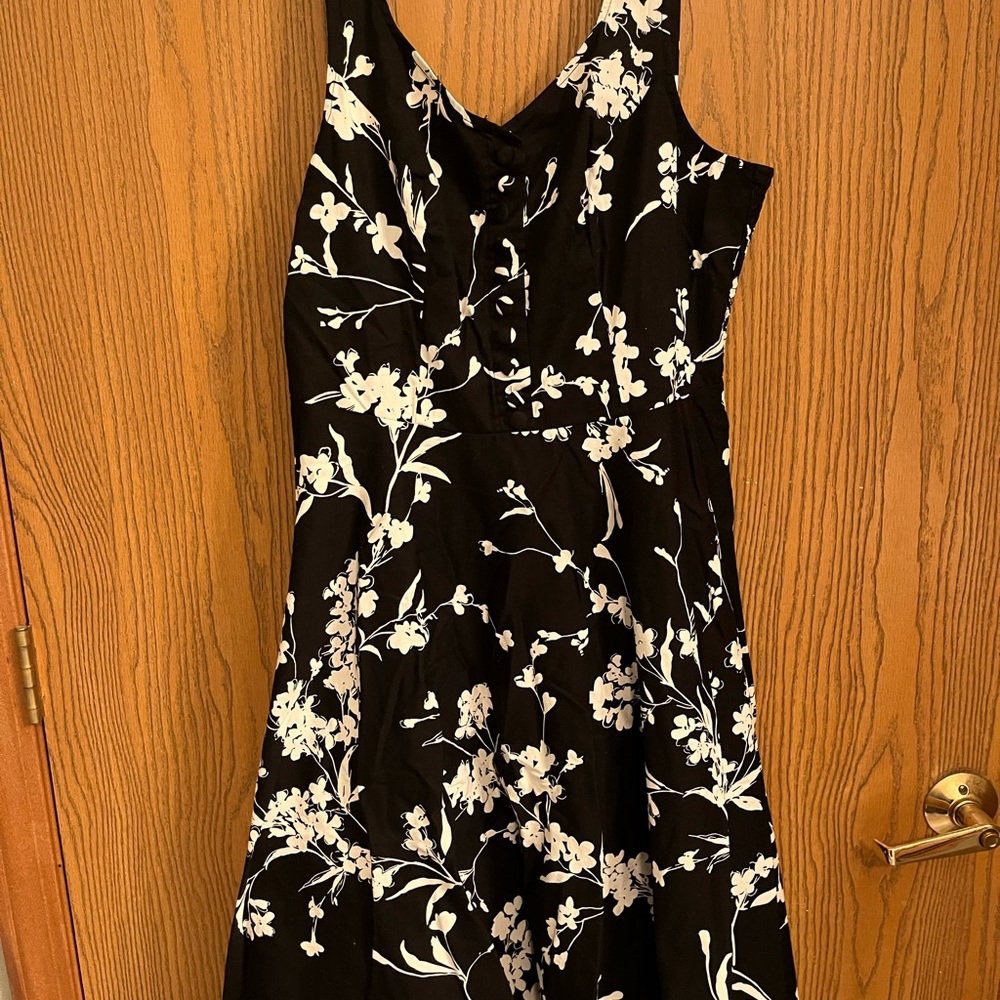 White and black dress with button detail